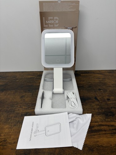 Magnifying travel mirror with - travel,