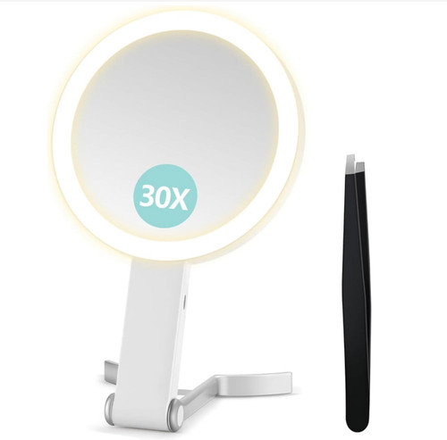 Magnifying mirror with - mirror, light